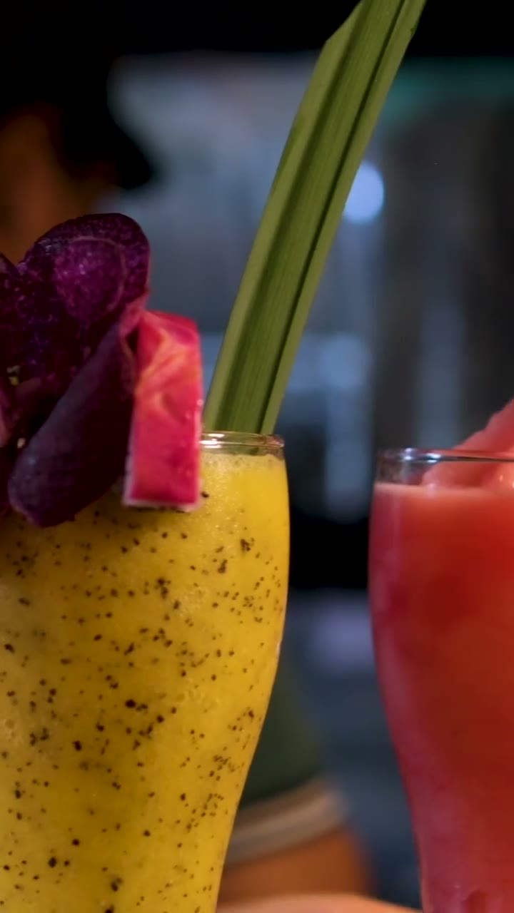 Cocktail being prepared behind a bar